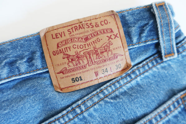 vintage Levis 501 / distressed Levis / 90s jeans / 1990s Levis 501 distressed denim Made in USA jeans 34
